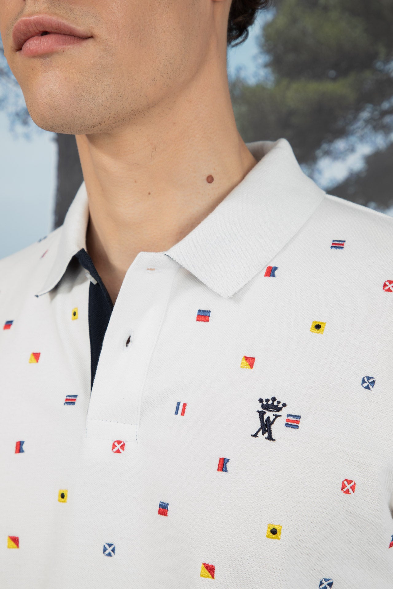 Polo à Broderies All Over